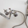 Тринити смеситель для ванны/душа двуручковый, настенный, с керамическим переключателем, трубчатый поворотный излив 320мм, лейка 70мм, держатель, шланг 1500мм, хром VIDIMA Trinity BA262AA